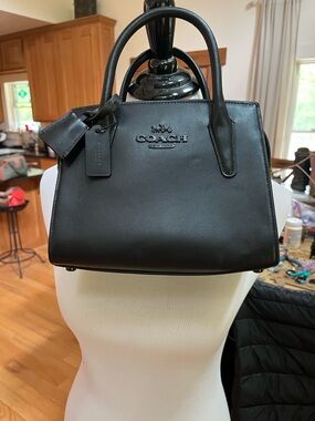Coach Andrea Carryall